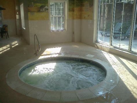 Jacuzzi® is a registered trademark owned by jacuzzi inc. Jacuzzi in indoor pool area - Picture of Country Inn ...