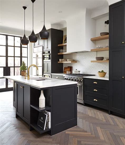 Black stained wood cabinetry combined with natural wood accents give this contemporary cooking space by the interior designers at let's talk kitchens a modern farmhouse vibe. 25 Trendy Contrasting Countertops For Your Kitchen - DigsDigs