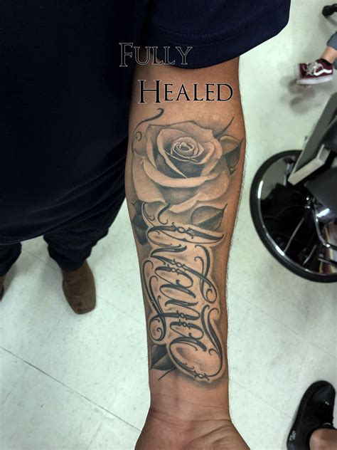Black and Gray Rose with Name Tattoo | Forearm name tattoos, Rose