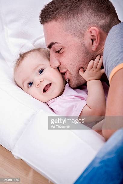 Dad Kissing Baby Skin Photos And Premium High Res Pictures Getty Images