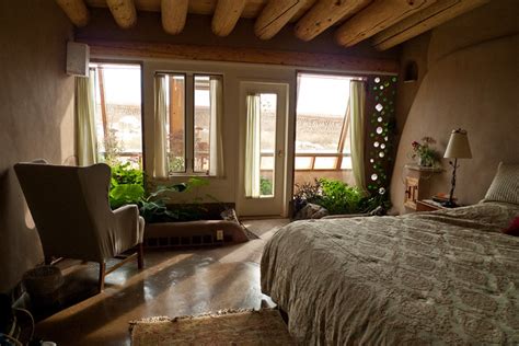 An earthship is a type of passive solar house that is made of both natural and upcycled materials. Earthship Bedroom | Flickr - Photo Sharing!