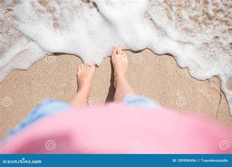 Close Up Of Female Feet On White Sandy Beach Stock Photo Image Of