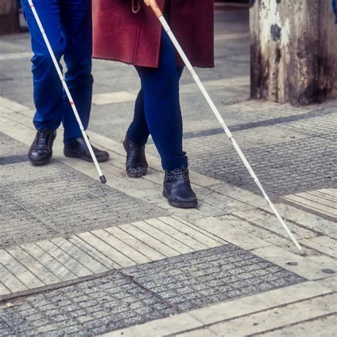 Blind Man And Woman Walking On The Street Stock Image Image Of