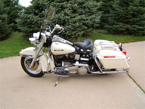 Vehicle used by a character or in a car chase. 1984 Harley-Davidson® FLH Electra Glide® (Birch White ...