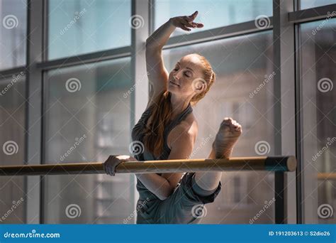 Young Woman Doing Stretching On Ballet Barre Stock Image Image Of
