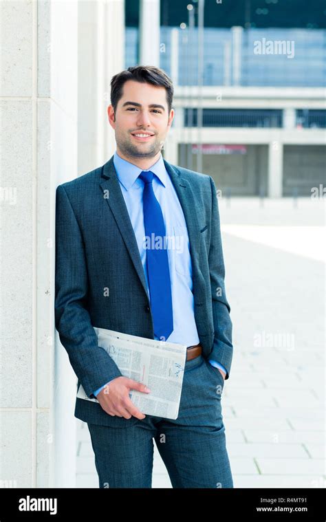 Businessman Reading Business Newspaper Stock Photo Alamy