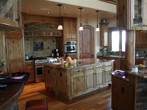 Old brick has a faded patina that adds character to the kitchen; Hand Crafted Knotty Alder Custom Made Kitchen Cabinets ...