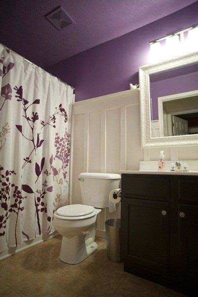 This example is an improvement over the above bathroom. wainscotting - purple and white bathroom / bath ideas - Juxtapost