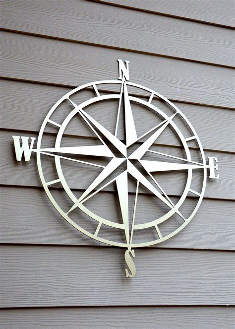 Decorate a luxury beach house, remodel a nautical bath, send a nautical gift, outfit a boat, find elegant coastal bedding and bath accessories. Nautical Compass Rose Metal Wall Art