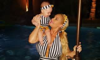 Coco Austin And Daughter Chanel Wear Matching Striped Swimsuits On Pool Playdate Daily Mail Online