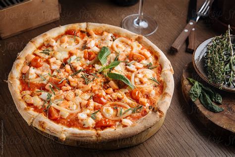 Seafood Pizza By Stocksy Contributor Pietro Karras Stocksy