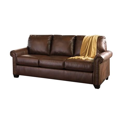 Quality foam cushion core construction. Ashley Lottie Leather Queen Sleeper Sofa in Chocolate ...