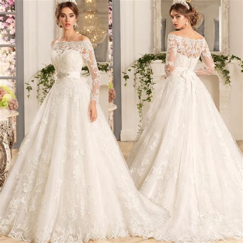 This ball gown wedding dress is perfect for a bride who wants something simple but that still makes a statement. Long Sleeve Wedding Dress, Ball Gown Wedding Dress,Off the ...