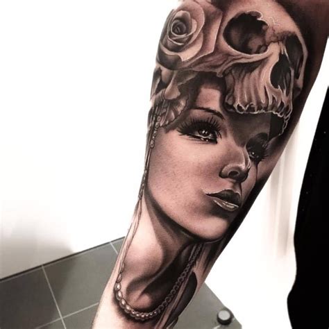 Arm Awesome Skull Girl Face With Roses Tattoo Design By Levi Barnett