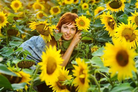Woman On Blooming Sunflower Field Stock Image Image Of Leisure Green