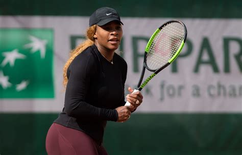 Serena williams tries to get up after slipping on the clay court on day two of the french open tennis. SERENA WILLIAMS Practises at Roland Garros French Open ...