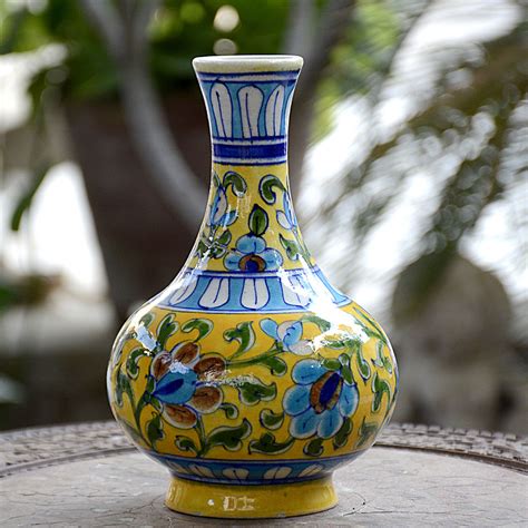 Blue rose pottery features handmade polish pottery, polish ceramics, polish glassware and skilled polish potters still individually handcraft and hand decorate each piece of pottery using small. Blue Pottery Yellow Floral Surahi Vase - 8 Inch