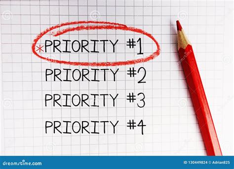 Number One Priority Marked with Red Circle on Math Notebook Stock Photo