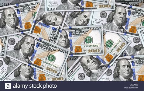 The old us $100 dollar bill. Close up money background with lots of new 100 US dollar ...