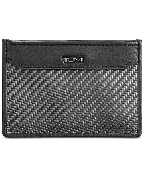 Secured by a snap closure, the bifold design features multiple card slots. Tumi Men's Slim Card Case in Gray for Men (Carbon) | Lyst