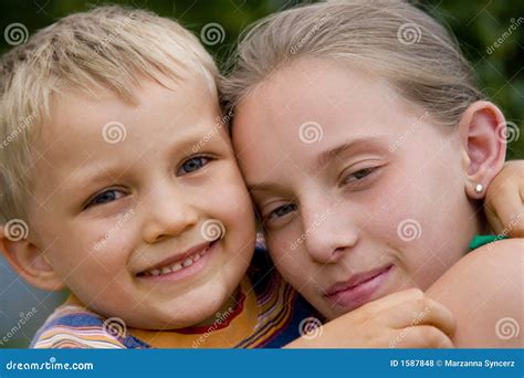 Loving Siblings Stock Photo Image Of Dimple Grinning 1587848