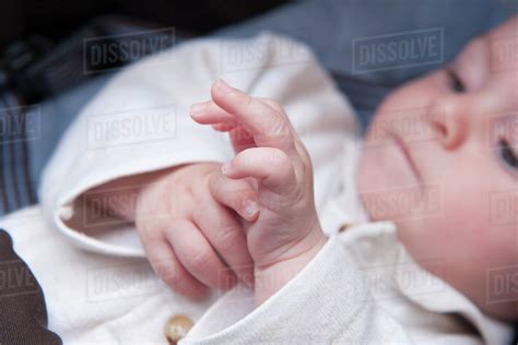 Babys Hands Clasped Stock Photo Dissolve