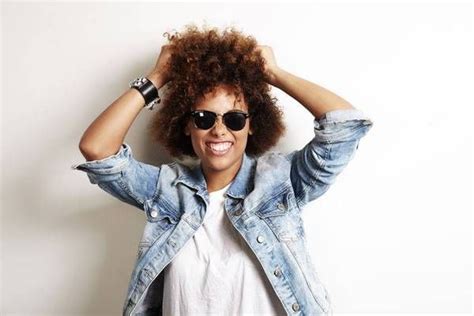 Style your hair into a loose bun in the a.m. How to Keep Curly Hair From Frizzing in Humidity | Curly ...