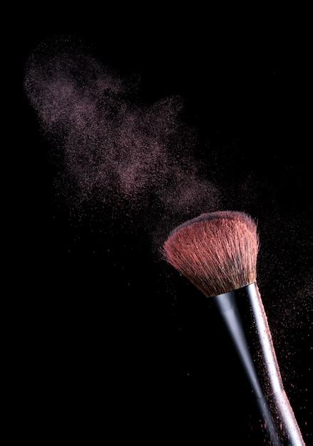 Premium Photo Makeup Brush With Pink Powder Dust On Black Background