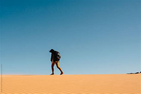 Girl Walking Through Desert By Stocksy Contributor Itla Stocksy