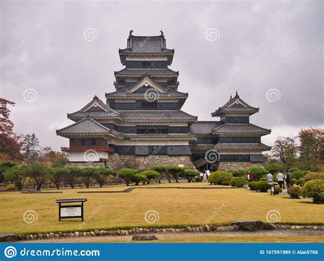 A View Across The Gardens Of The Wooden Crow Castle In Matsumoto In