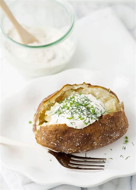 How to make easy loaded potato casserole: Baked Potatoes with Garlic Herb Sour Cream - Baked Bree
