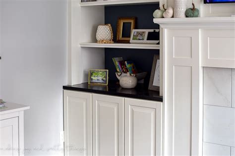 Thoughtful details—tiny metallic knobs, open shelves that. IKEA Hack: Kitchen Cabinets Turned Built Ins