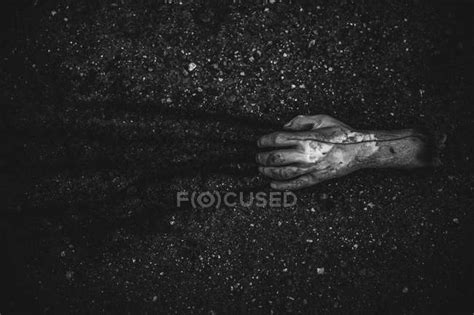 Bloody Cut Hand Dragging On Ground — Top View Body Stock Photo