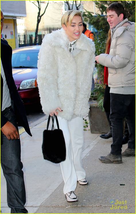 Full Sized Photo Of Miley Cyrus White Fur Coat 01 Miley Cyrus To Perform At New Years Rockin