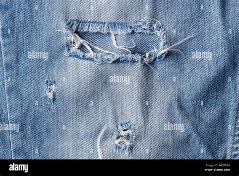 Torn Denim Wallpaper