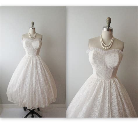 A variation of the elegant sophisticated design above. 50s Wedding Dress // Vintage 1950s Strapless White Lace