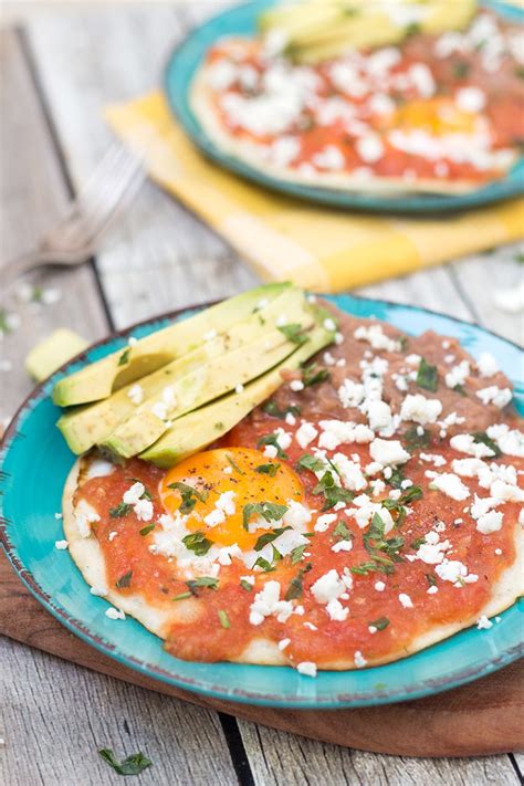 It is really easy to make this pretty darn good, flavorful and hearty mexican breakfast recipe! Easy Huevos Rancheros Recipe - Mexican Breakfast Eggs