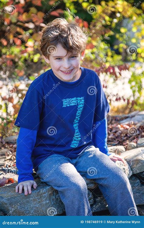 Portrait Of Seven Year Old Boy Outside Stock Image Image Of Laugh