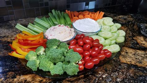 Veggie Tray Celery Carrots Cucumbers Cherry Tomatoes Broccoli And Bell Peppers With Ranch