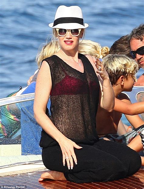 Gwen Stefani Wears A Hot Pink Bikini As She Suns Herself On Speedboat