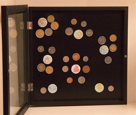 Display Foreign Coins In A Simple Shadowbox To Showcase Your Travels
