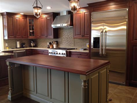 Two Tone Kitchen Island Has A Wood Counter Top To Match The Stained