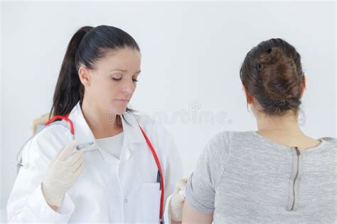 Young Female Doctor Examining Woman Patient Stock Photo Image Of