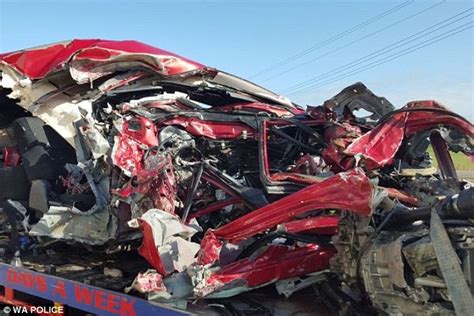 A Mangled Mazda Pictured After Slamming Into A Road Trai Killing A 30