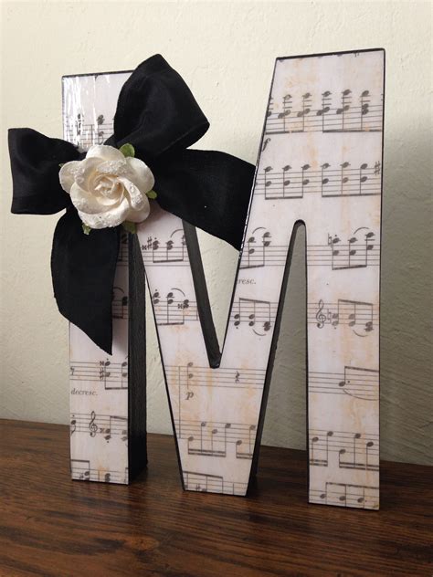 Maybe you would like to learn more about one of these? Cute DIY gift for music teacher...use their initial ...