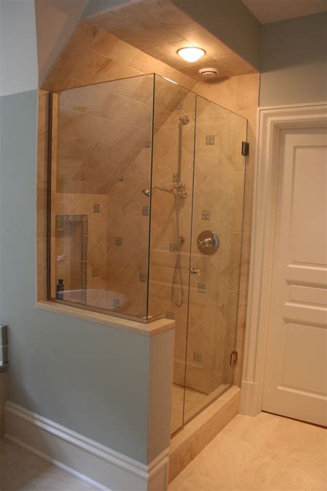Remodeling a small bathroom may not be a small fit, but it doesn't have to be expensive and dull. Frameless corner glass shower with slanted ceiling and ...
