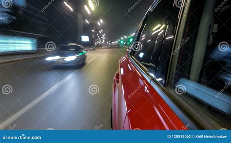 Drivelapse Urban Look From Fast Driving Car At A Night Avenue In A City