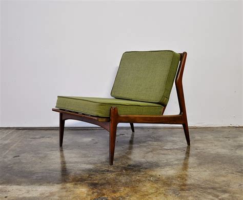 Since then, slipper chairs have been produced in all manner of styles, from the midcentury modern look with a tight back. SELECT MODERN: Ib Kofod-Larsen Slipper Chair
