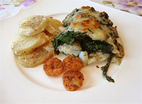 Kochen sie den reis, bis sie weich in gesalzenem wasser. Fisch - Kartoffel - Auflauf mit Spinat und Knoblauch von ...