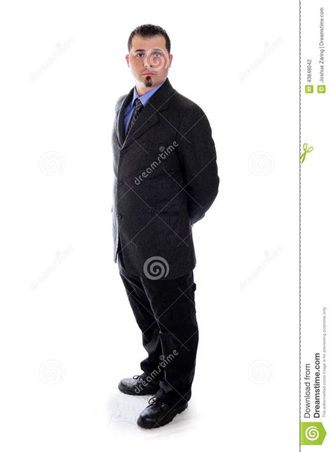 Man In Suit Holding His Hands Behind Back Download From Over 46